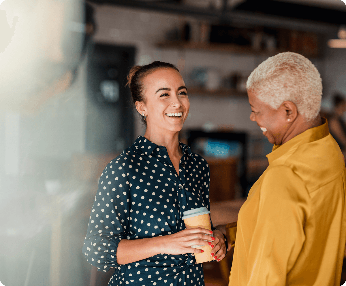 Happy woman waving at laptop during therapy session